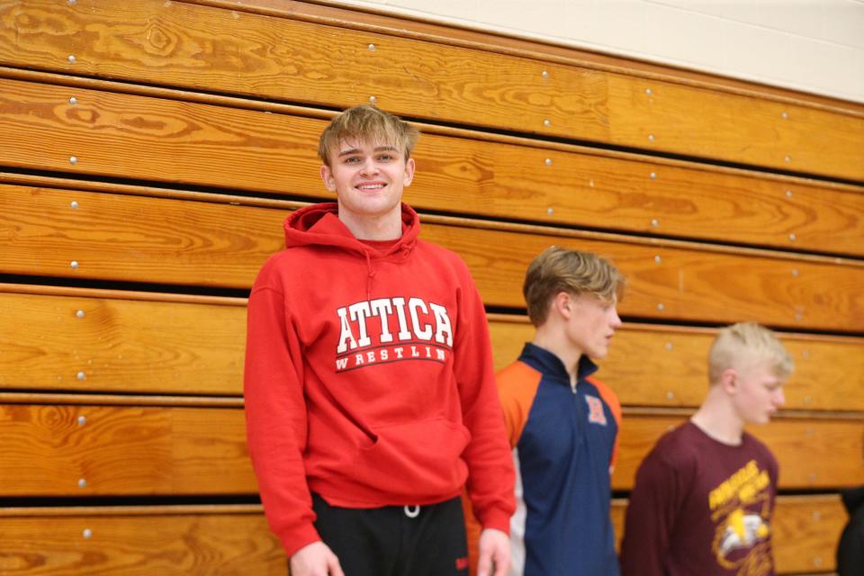Attica wrestler Boden Rice atop the podium after claiming his first IHSAA Regional Championship at 150 pounds at the Berry Bowl in Logansport on Friday, Feb. 3, 2024.