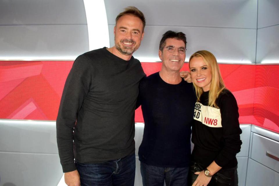 Music mogul: Simon Cowell with Jamie Theakston and Amanda Holden (Global)