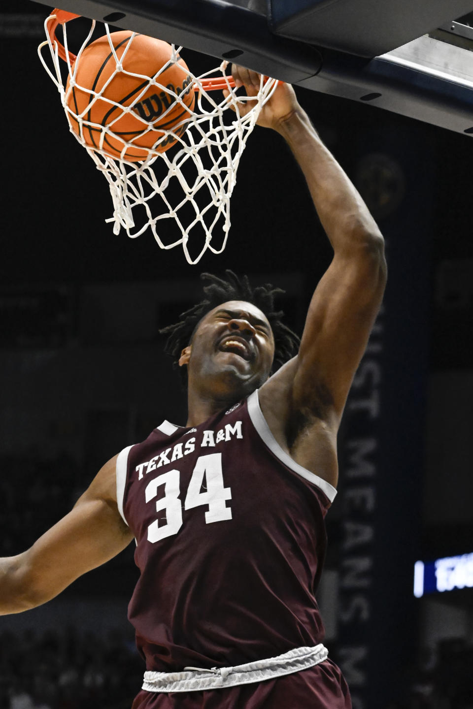 Texas A&M forward Julius Marble dunks against Alabama during the second half of an NCAA college basketball game in the finals of the Southeastern Conference Tournament, Sunday, March 12, 2023, in Nashville, Tenn. (AP Photo/John Amis)