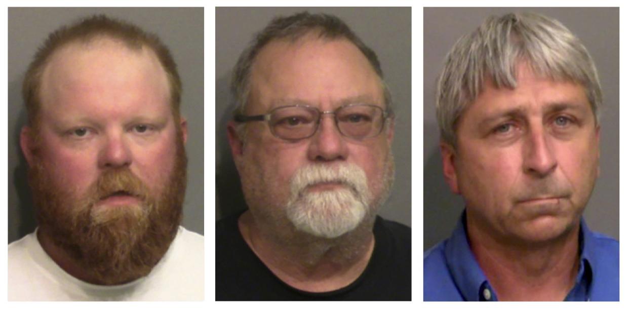 This combination of booking photos provided by the Glynn County, Ga., Detention Center, shows, from left, Travis McMichael, his father, Gregory McMichael, and William "Roddie" Bryan Jr. On Friday, Oct. 1, 2021, a Georgia judge has ruled that Ahmaud Arbery's mental health records can't be used as trial evidence by the men who chased and killed him.