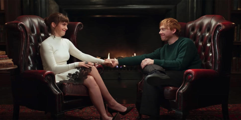 Emma Watson and Rupert Grint share a moment in the special.  (YouTube)