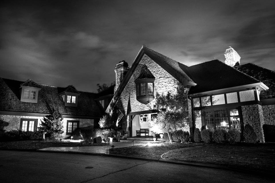 A midnight view of the Fox Hollow Farm main house in Westfield, Indiana on Tuesday, Oct. 16, 2012. The former home is the suspected scene of up to 16 murders of young men in Indianapolis by suspected serial killer Herb Baumeister, owner of the Sav-a-Lot shopping chain.