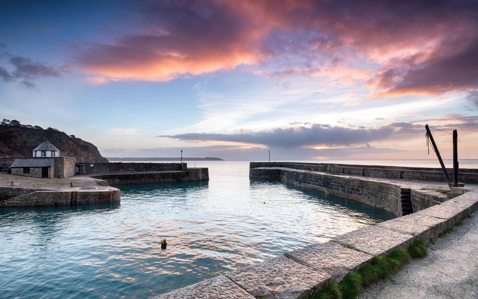 Charlestown's tiny harbour at sunset - Credit: ALAMY