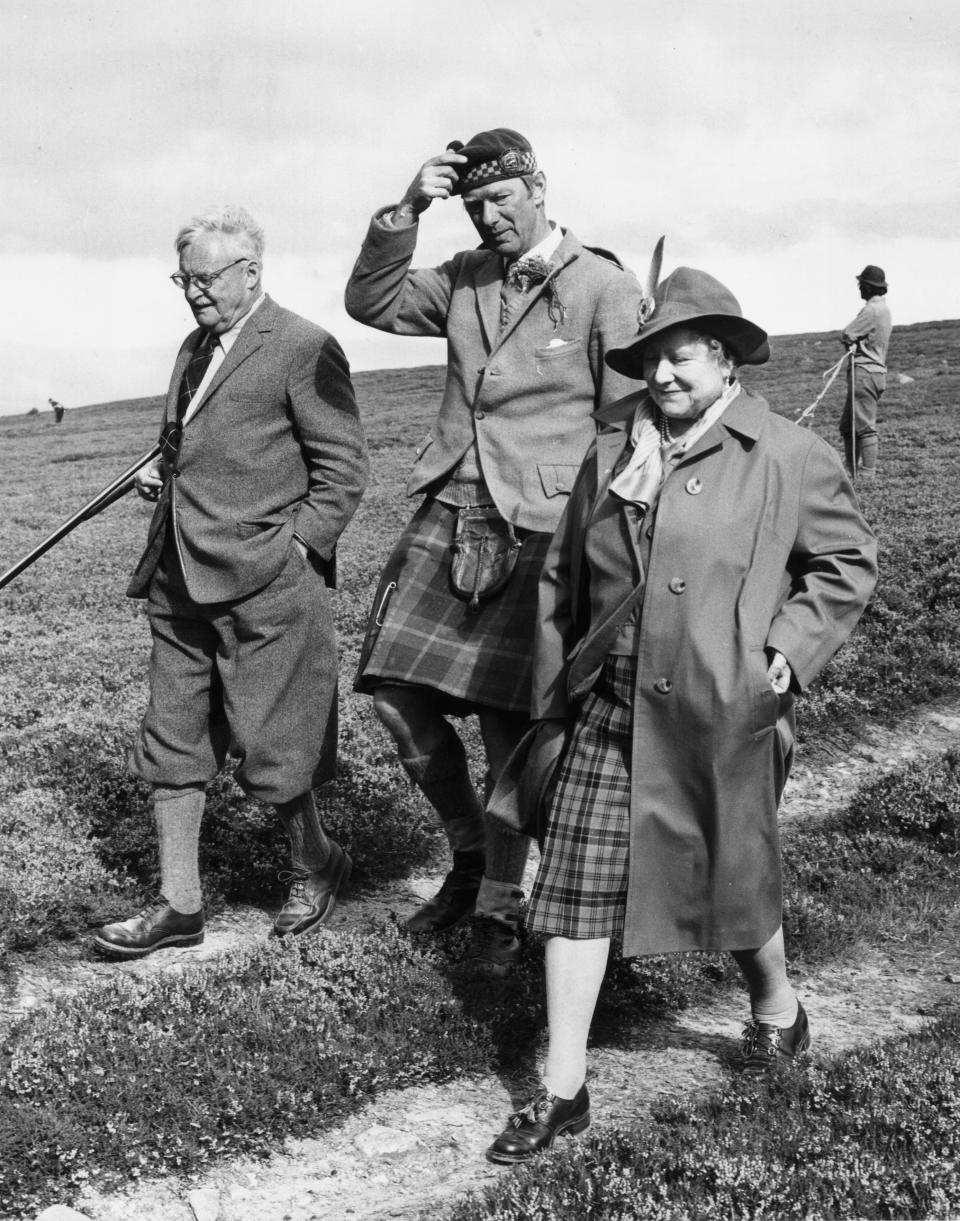 Elizabeth, the Queen Mother (right) attends the North of Scotland Gundog Association retriever trials at Balmoral in 1973.