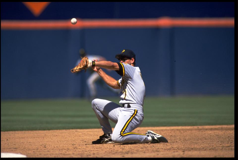 22 AUG 1993: A ground ball takes a bad bounce at Jeff King, <a class="link " href="https://sports.yahoo.com/mlb/teams/pittsburgh/" data-i13n="sec:content-canvas;subsec:anchor_text;elm:context_link" data-ylk="slk:Pittsburgh Pirates;sec:content-canvas;subsec:anchor_text;elm:context_link;itc:0">Pittsburgh Pirates</a> third baseman during their game against the <a class="link " href="https://sports.yahoo.com/mlb/teams/san-diego/" data-i13n="sec:content-canvas;subsec:anchor_text;elm:context_link" data-ylk="slk:San Diego Padres;sec:content-canvas;subsec:anchor_text;elm:context_link;itc:0">San Diego Padres</a>. Credit: Stephen Dunn/Allsport