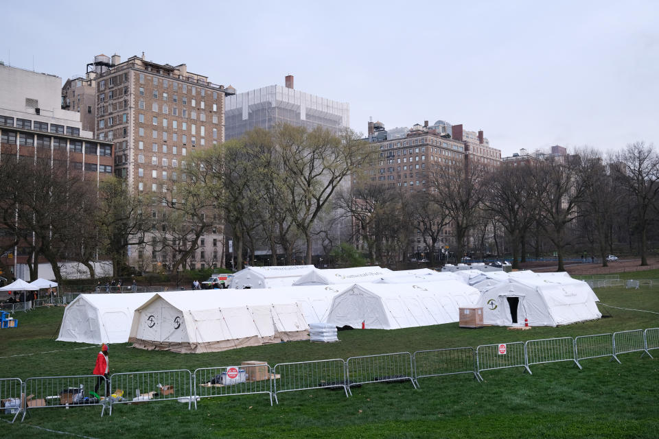 NEW YORK, NEW YORK - MARCH 30: Members of the international Christian humanitarian organization Samaritans's Purse, put the finishing touches on a field hospital in New York's Central Park on March 30, 2020 in New York City. The group, which is led by Franklin Graham, has deployed to help combat the coronavirus outbreak in New York. Samaritan's Purse will open a 68-bed field hospital that is specifically equipped to serve as a respiratory care unit.  (Photo by Spencer Platt/Getty Images)