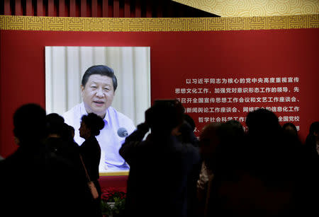 People visit an exhibition displaying China's achievements for the past five years, as a part of the celebrations of the upcoming 19th National Congress of the Communist Party of China (CPC) at Beijing Exhibition Centre in Beijing, China October 10, 2017. REUTERS/Jason Lee