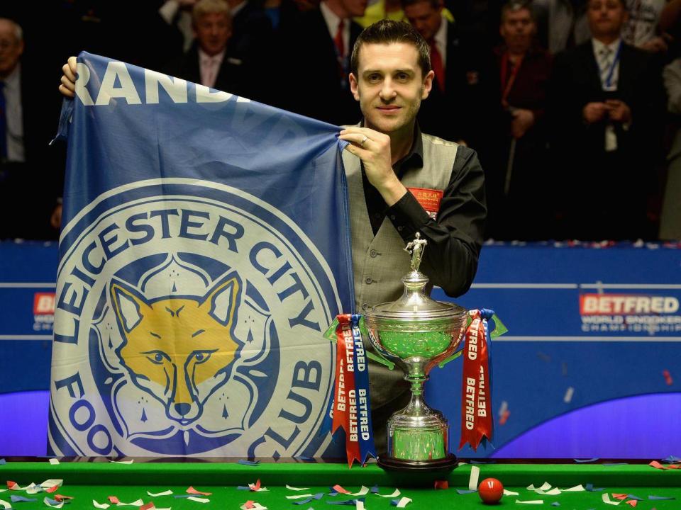 Mark Selby celebrates his 2016 victory at the Crucible (Getty)