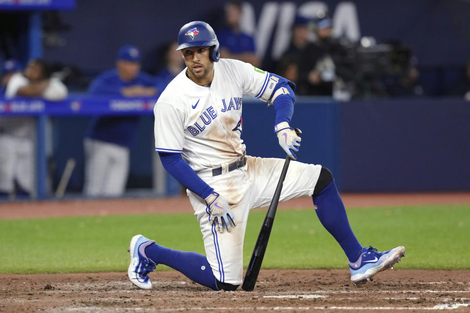 Toronto Blue Jays' George Springer reacts after hitting a foul ball during the seventh inning of the team's baseball game against the San Diego Padres on Wednesday, July 19, 2023, in Toronto. (Chris Young/The Canadian Press via AP)