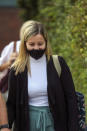 Teacher Kandice Barber, 35, leaves Aylesbury Crown Court, Buckinghamshire, after being found guilty of two sex offence charges related to sending topless Snapchat pictures to a 15-year-old student. The jury were unable to reach verdicts on three more serious charges of causing or inciting a child aged under 16 to engage in a sexual act.