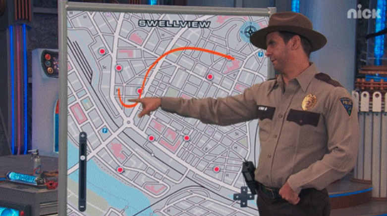 cop pointing to a map