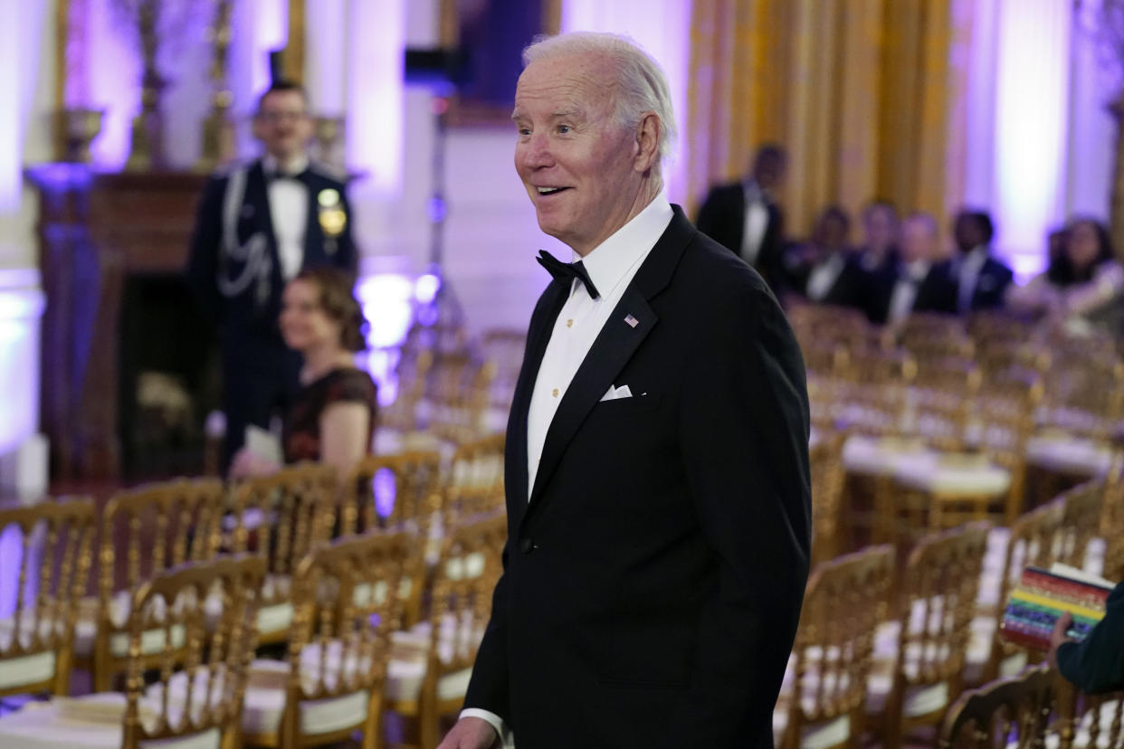 President Joe Biden arrives in the East Room of the White House following a dinner reception for the governors and their spouses, Saturday, Feb. 11, 2023, in Washington. (AP Photo/Manuel Balce Ceneta)