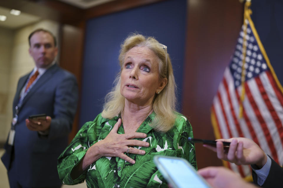 Rep. Debbie Dingell, D-Mich., pauses for reporters after a meeting of the House Democratic Caucus, Tuesday, June 15, 2021, at the Capitol in Washington. Dingell, who has sponsored several PFAS-related bills in the House, said she has looked for PFAS in her own makeup and lipstick, but could not see if they were present because the products were not properly labeled. (AP Photo/J. Scott Applewhite)
