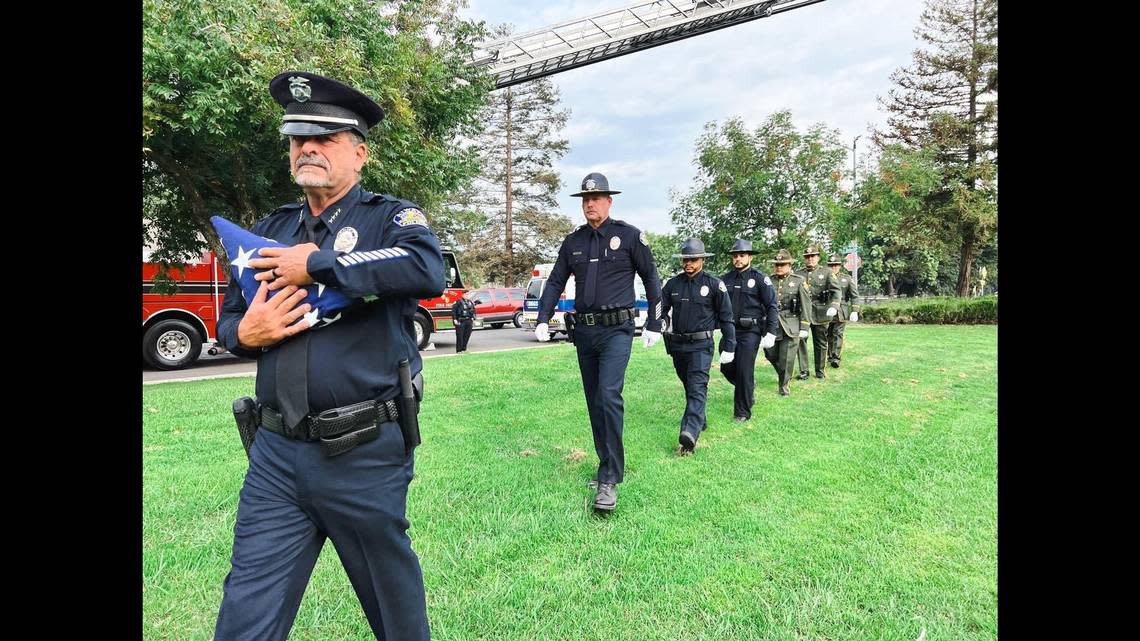 Local law enforcement, first responders and members of the community gather to remember those who lost their lives in the Sept. 11, 2001 terrorist attacks, during a ceremony in Atwater, Calif., on Sunday, Sept. 11, 2022. Image courtesy of Merced County Sheriff’s Office.