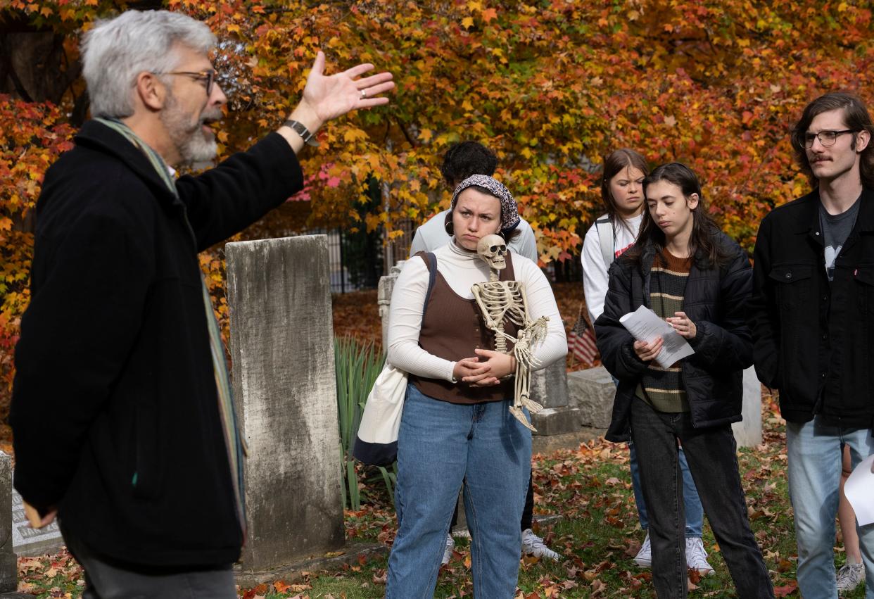 Otterbein University philosophy professor Andrew Mills teaches a "philosophy of death" course and, as part of it, takes students to Olde Methodist Cemetery in Westerville.