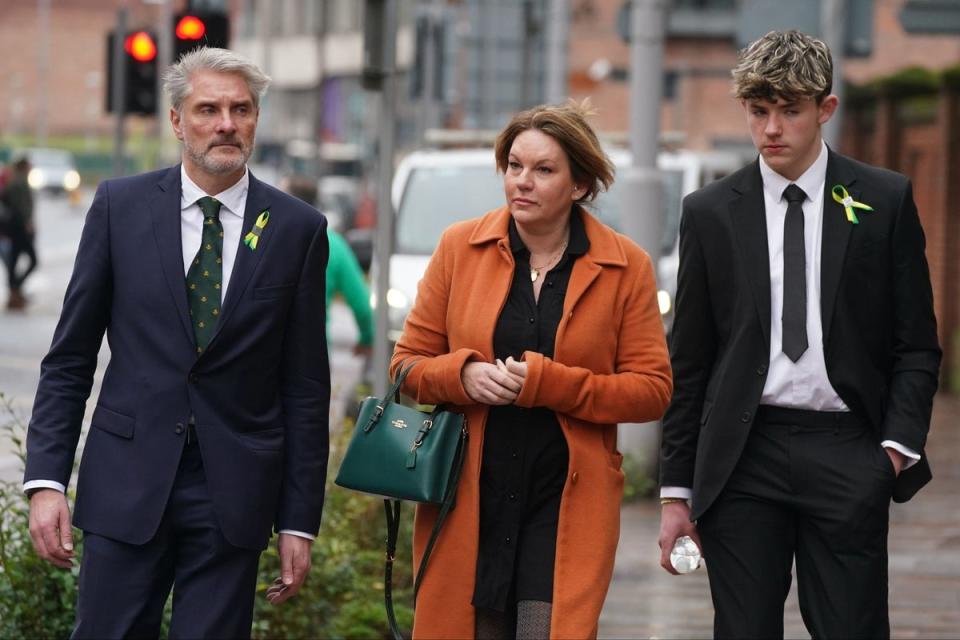 Barnaby Webber's family (left to right) father David Webber, mother Emma Webber and brother Charlie Webber (PA)