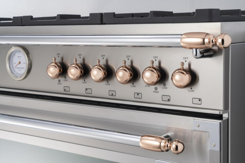 Copper knobs and handles elevate this high-end gas range.<p>Bertazzoni</p>