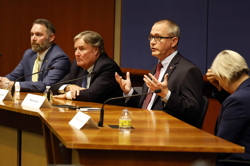 Republican state Supreme Court candidate Trey Allen, second right, speaks during the North Carolina Supreme Court Candidate Forum at Duke University Law School in Durham, N.C., Wednesday, Oct. 26, 2022. (AP Photo/Karl DeBlaker)