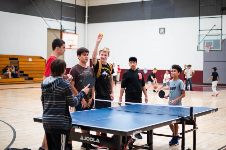 Paso Robles teens play ping pong at the new Paso Robles Teen Center at the Centennial Park gymnasium on August 21, 2023.