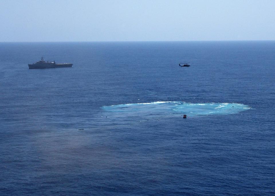 The decommissioned aircraft carrier, USS America (CV 66), was laid to rest after being sunk at sea.