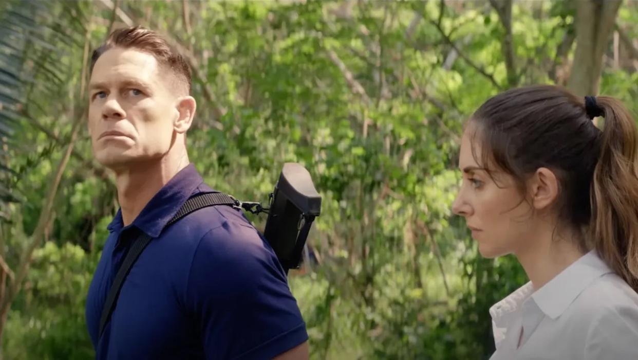  John Cena and Alison Brie as Mason and Claire in the jungle in Freelance. 