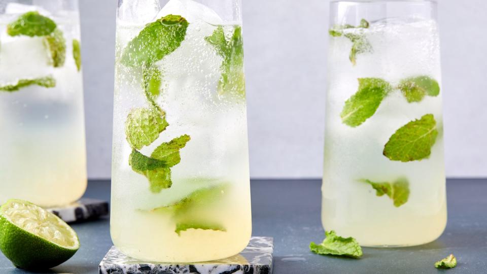 mojito cocktail with fresh lime juice and mint leaves