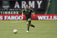 Portland Timbers midfielder Sebastian Blanco pushes the ball ahead during an MLS soccer match against Los Angeles FC, Sunday, Sept. 19, 2021, in Portland, Ore. (Sean Meagher/The Oregonian via AP)