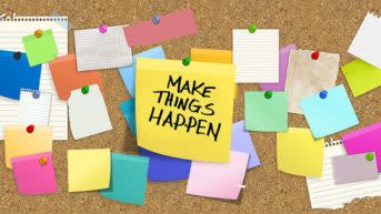 post-its with the focus on one saying "Make Things Happen"