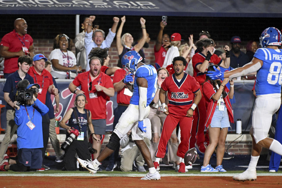 Mississippi wide receiver Tre Harris (9) reacts after his winning touchdown catch during the second half of an NCAA college football game against LSU in Oxford, Miss., Saturday, Sept. 30, 2023. (AP Photo/Thomas Graning)