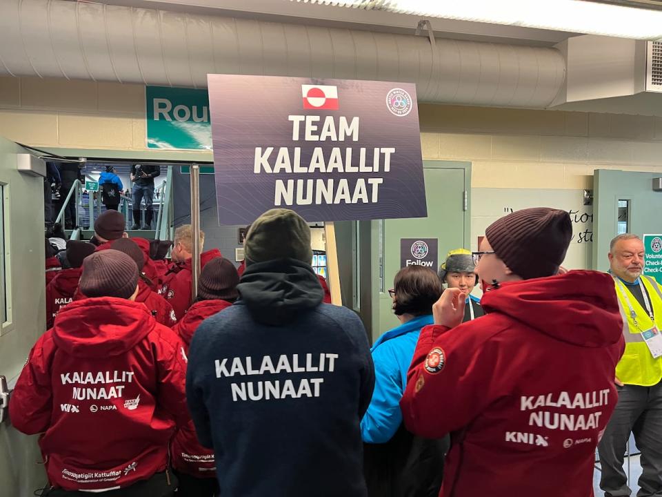 Team Kalaallit Nunaat shows off their uniforms ahead of the opening ceremonies at the 2024 Arctic Winter Games on Sunday. 