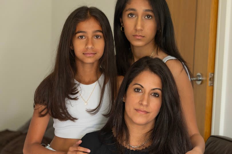 Dr Shivani Tanna and her two daughters -Credit:Manchester Evening News