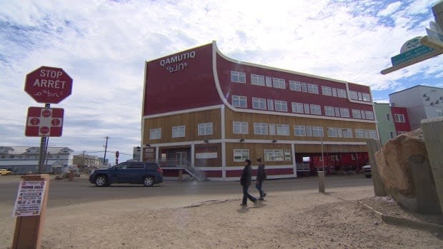 The view of the Qamutiq building from in front of Building 263. While COVID-19 restrictions eased in Iqaluit on Thursday, the Nunavut health department said it will continue to carry out surveillance testing in the capital.  (Vincent Robinet/CBC - image credit)