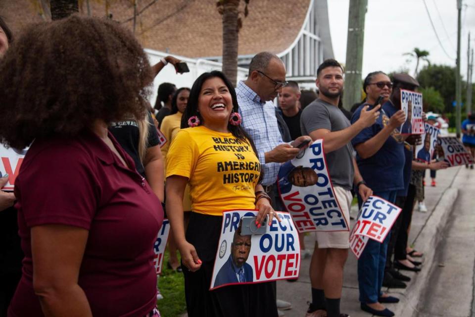 Karla Hernandez Mats, United Teachers of Dade president, smiles as the Stay Woke Florida bus tour arrives at Mt. Olive Missionary Baptist Church on Thursday, June 22, 2023 in South Miami, Florida.