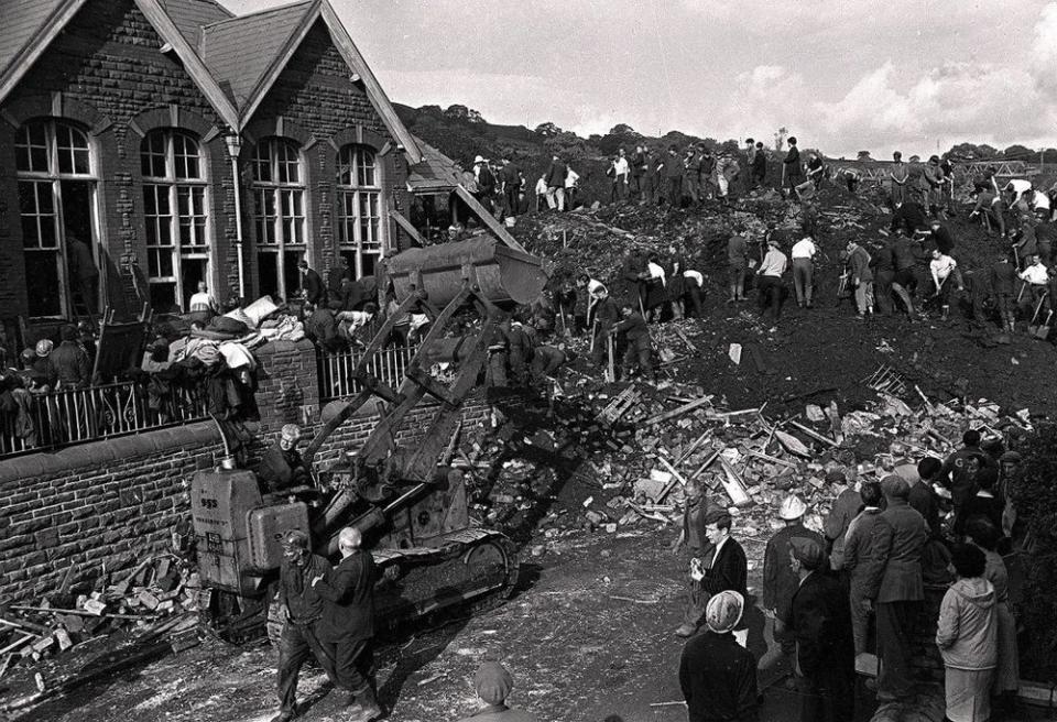 School engulfed by coal killing children and teachers buried in the school and surrounding area