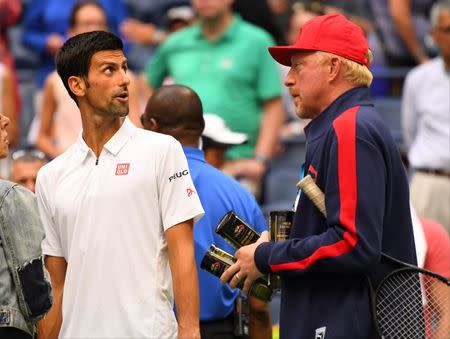 Sept 2, 2016; New York, NY, USA; Novak Djokovic of Serbia works out on Ashe court under the supervision of coach Boris Becker on day five of the 2016 U.S. Open tennis tournament at USTA Billie Jean King National Tennis Center. Robert Deutsch-USA TODAY Sports