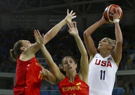 2016 Rio Olympics - Basketball - Final - Women's Gold Medal Game USA v Spain - Carioca Arena 1 - Rio de Janeiro, Brazil - 20/8/2016. Elena Delle Donne (USA) of USA shoots past Leonor Rodriguez (ESP) of Spain and Lucila Pascua (ESP) of Spain. REUTERS/Jim Young