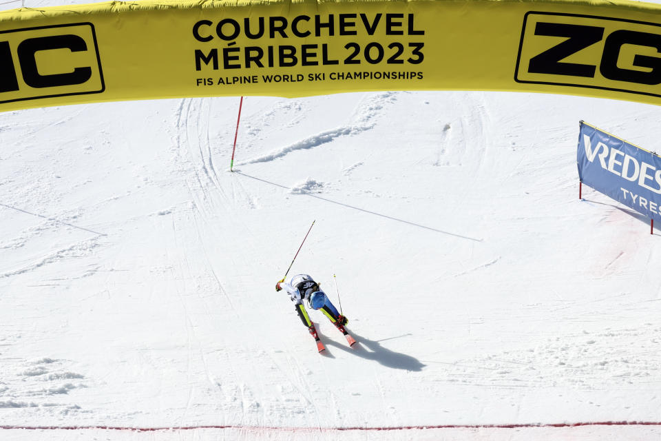 United States' Mikaela Shiffrin crosses the finish line to win the silver medal of the women's World Championship slalom, in Meribel, France, Saturday Feb. 18, 2023. (AP Photo/Alessandro Trovati)