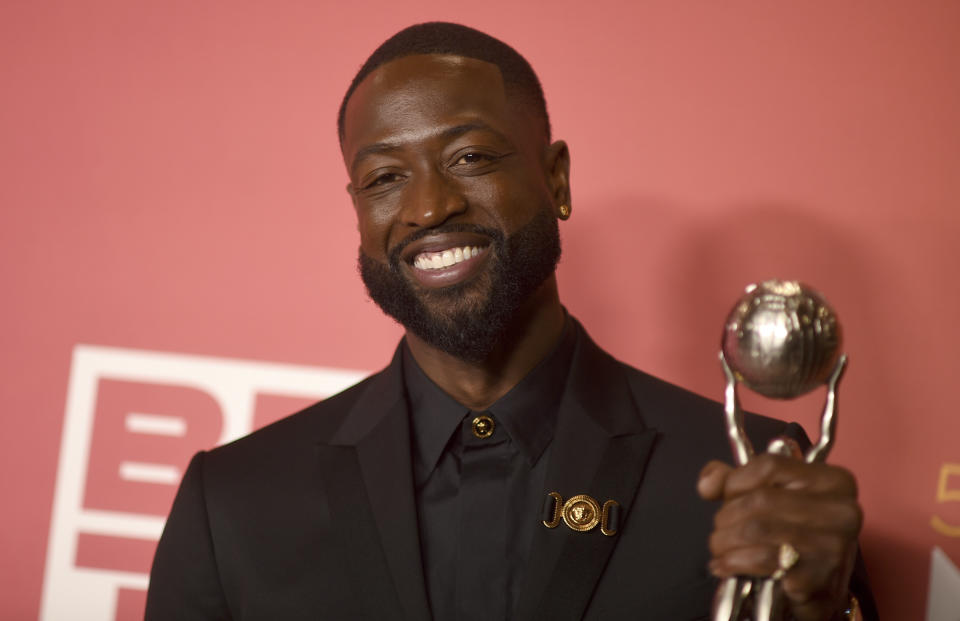 Dwyane Wade poses with the president's award in the press room at the 54th NAACP Image Awards on Saturday, Feb. 25, 2023, at the Civic Auditorium in Pasadena, Calif. (Photo by Richard Shotwell/Invision/AP)