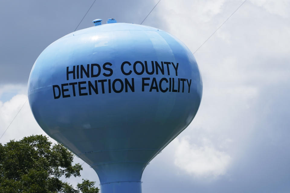 FILE - A water tower looms at the Raymond Detention Center in Raymond, Miss., on Aug. 1, 2022. Mississippi’s largest county secured a legal victory Wednesday, Dec. 28, in its effort to stave off a rare federal takeover of its jail, where a judge found “ongoing unconstitutional conditions” for inmates. (AP Photo/Rogelio V. Solis, File)