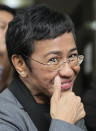 Filipino journalist Maria Ressa, 2021 Nobel Peace Prize winner and Rappler CEO, gestures as she talks to reporters after being acquitted by the Pasig Regional Trial Court over a tax evasion case in Pasig city, Philippines on Tuesday, Sept. 12, 2023. (AP Photo/Aaron Favila)