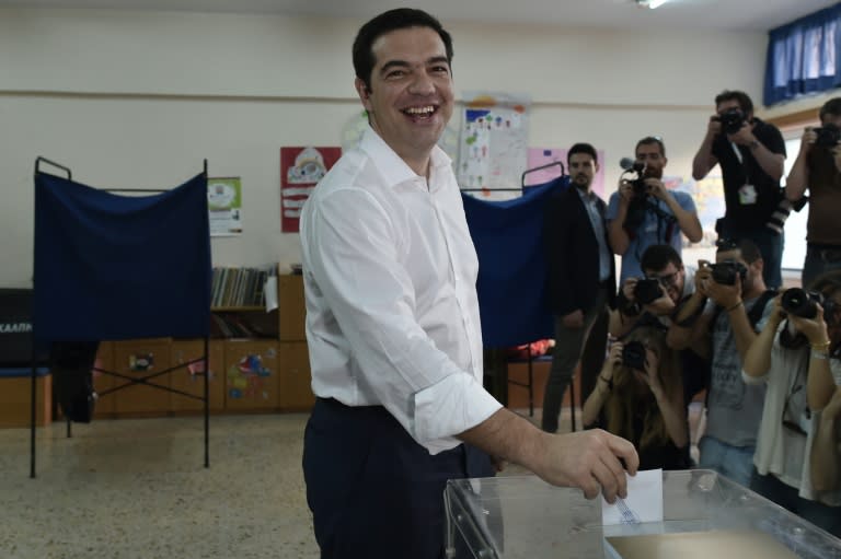 Greek Prime Minister Alexis Tsipras casts his ballot during the Greek referendum in Athens on July 5, 2015