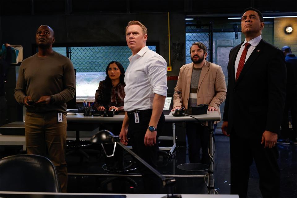 THE BLACKLIST -- "The Freelancer: Part 2" Episode 1007 -- Pictured: (l-r) Hisham Tawfiq as Dembe Zuma, Anya Banerjee as Siya Malik, Diego Klattenhoff as Donald Ressler, Alex Brightman as Herbie Hambright, Harry Lennix as Harold Cooper -- (Photo by: Will Hart/NBC)