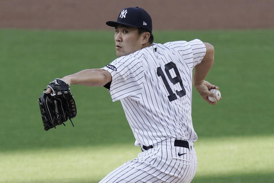 New York Yankees starting pitcher Masahiro Tanaka (19) throws against the Tampa Bay Rays during the first inning in Game 3 of a baseball American League Division Series, Wednesday, Oct. 7, 2020, in San Diego. (AP Photo/Jae C. Hong)