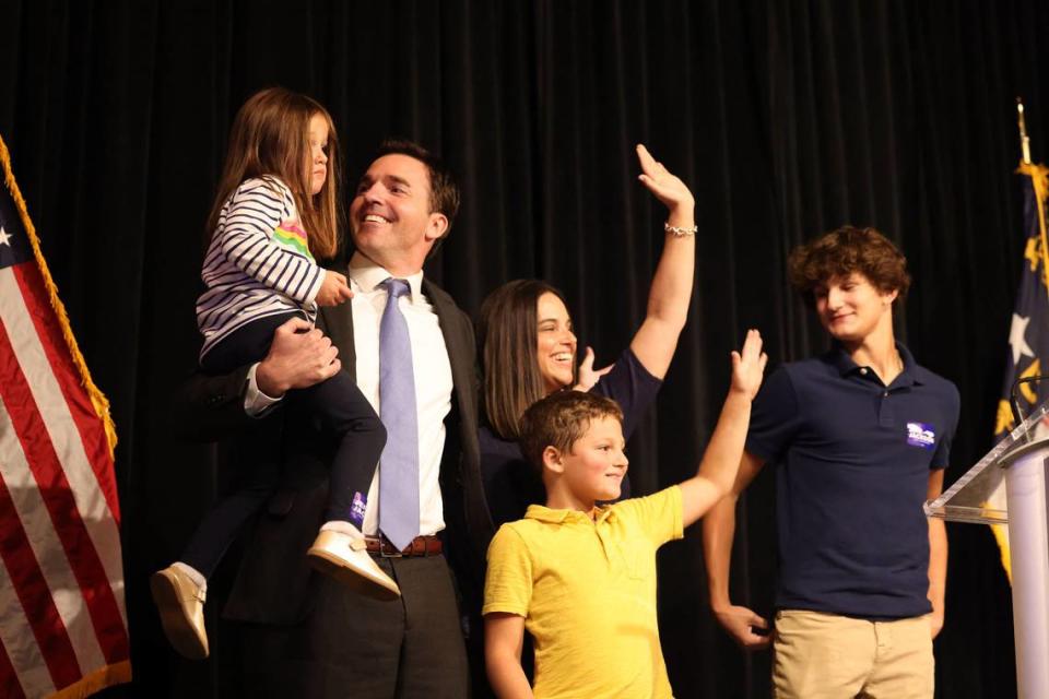 Then-state Sen. Jeff Jackson and his family greet guests at Lenny Boy Brewing Co. in Charlotte on Tuesday, Nov. 8, 2022.