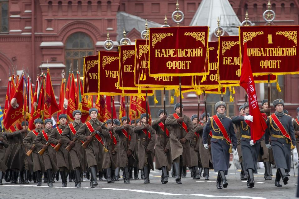 Russian soldiers march during a reconstruction of a World War II-era parade in Moscow's Red Square, Russia, Thursday, Nov. 7, 2019. The Nov. 7, 1941 parade saw Red Army soldiers move directly to the front line in the Battle of Moscow, becoming a symbol of Soviet valor and tenacity in the face of overwhelming odds. (AP Photo/Alexander Zemlianichenko)