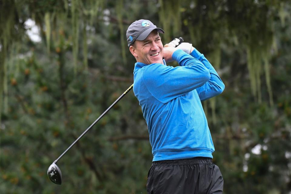 Peyton Manning hits his tee shot on the 10th hole during the second round of the AT&T Pebble Beach Pro-Am golf tournament on Feb. 10, 2017.