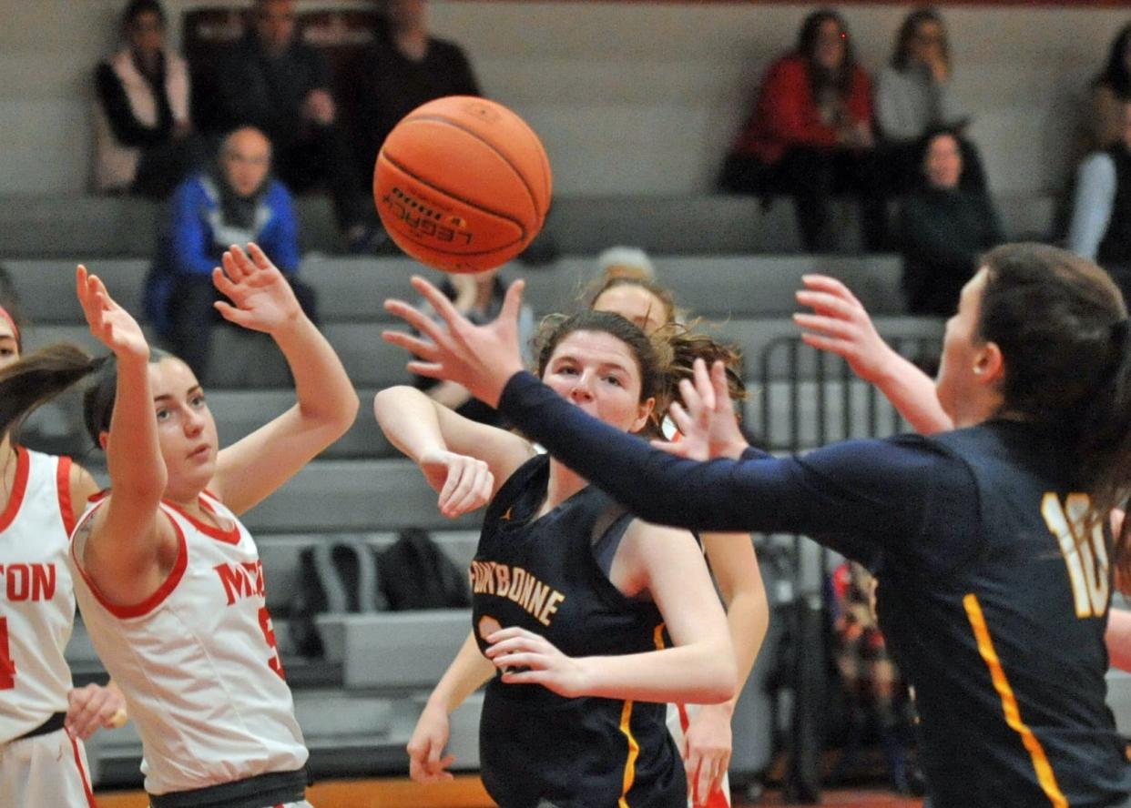 Fontbonne Academy's Lilly Blow, right, prepares to intercept the pass from Miton's Grace Henry, left, during girls basketball action at Milton High School, Thursday, Jan. 12, 2023.