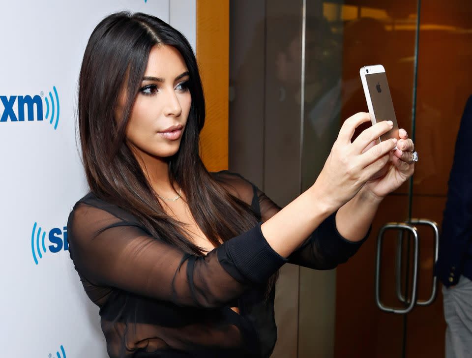 Kim Kardashian is widely accepted as the revolutionary behind the selfie, pictured here in 2014. Source: Getty