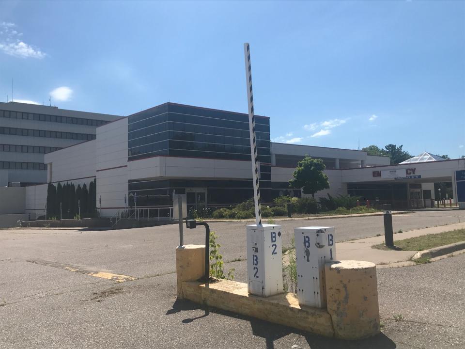 The empty parking lots of the former Marquette General Hospital in late July 2022.