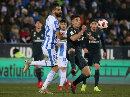 Soccer Football - Copa del Rey - Round of 16 - Second Leg - Leganes v Real Madrid - Butarque Municipal Stadium, Leganes, Spain - January 16, 2019 Leganes' Dimitris Siovas in action with Real Madrid's Cristo Ramon Gonzalez Perez REUTERS/Javier Barbancho